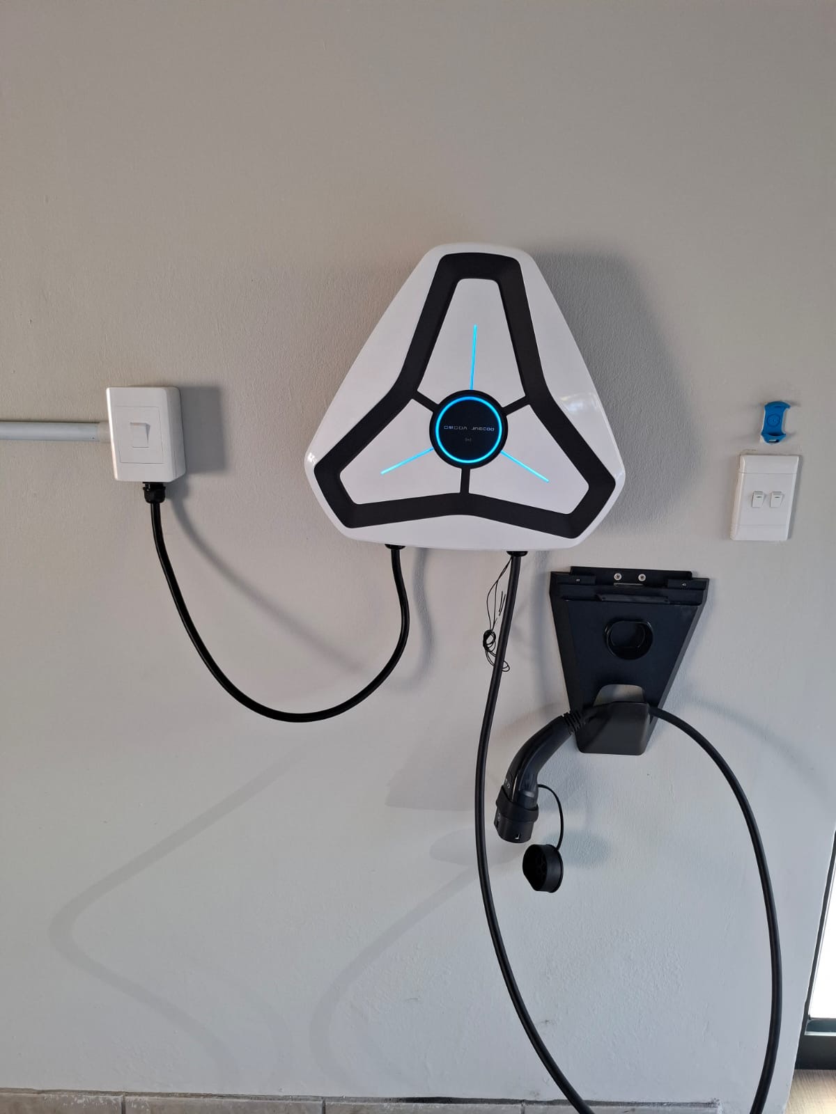Omoda Jaecoo wall charger installed with isolator and cable holster